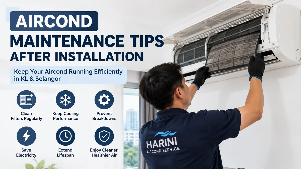 Homeowner and technician reviewing post-installation aircond maintenance in Kuala Lumpu